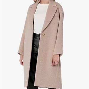 makes a statement with an exceptionally soft Italian alpaca mohair blend